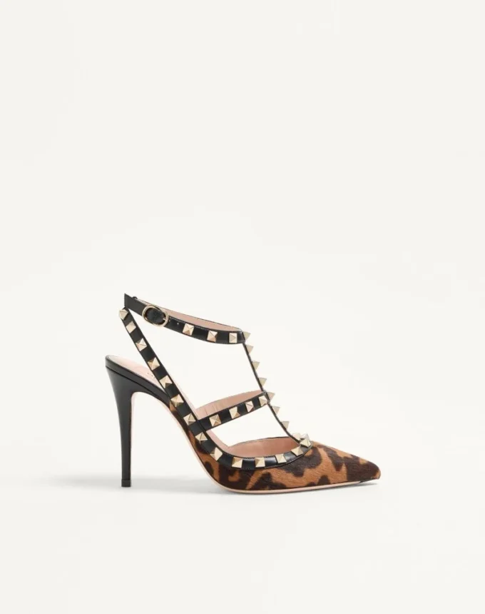Γόβες Rockstud με λουράκια από δέρμα μοσχαριού με εφέ πόνυ 100 mm Γόβες Rockstud με λουράκια από δέρμα μοσχαριού με εφέ πόνυ 100 mm