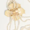Κολιέ Fleur Lumineuse από μέταλλο, σμάλτο, μαργαριτάρια και ύφασμα Κολιέ Fleur Lumineuse από μέταλλο, σμάλτο, μαργαριτάρια και ύφασμα