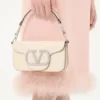 Μικρή τσάντα ώμου Valentino Garavani Locò με λογότυπο Jewel Μικρή τσάντα ώμου Valentino Garavani Locò με λογότυπο Jewel