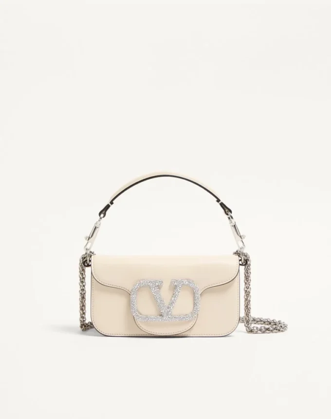 Μικρή τσάντα ώμου Valentino Garavani Locò με λογότυπο Jewel Μικρή τσάντα ώμου Valentino Garavani Locò με λογότυπο Jewel