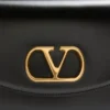 Μικρή τσάντα ώμου Valentino Garavani Vain από γυαλιστερό δέρμα μοσχαριού Μικρή τσάντα ώμου Valentino Garavani Vain από γυαλιστερό δέρμα μοσχαριού