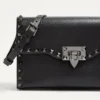 Μικρή τσάντα Rockstud Grainy Calfskin Crossbody Μικρή τσάντα Rockstud Grainy Calfskin Crossbody