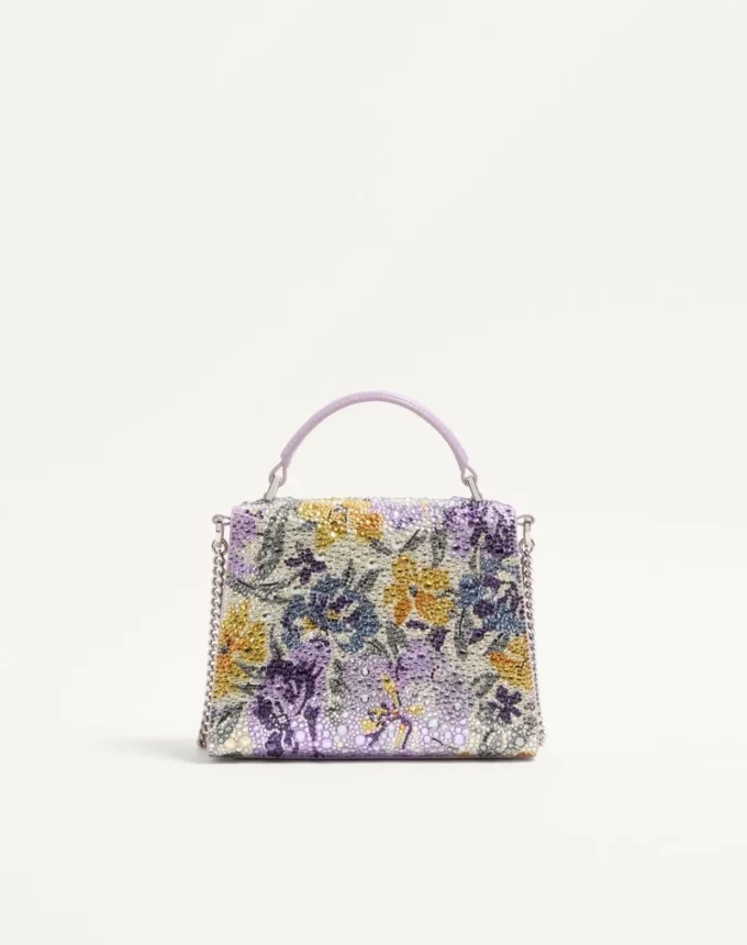 Μίνι τσάντα Valentino Garavani Vsling με μοτίβο Flowerism από στρας και λογότυπο με κόσμημα Μίνι τσάντα Valentino Garavani Vsling με μοτίβο Flowerism από στρας και λογότυπο με κόσμημα