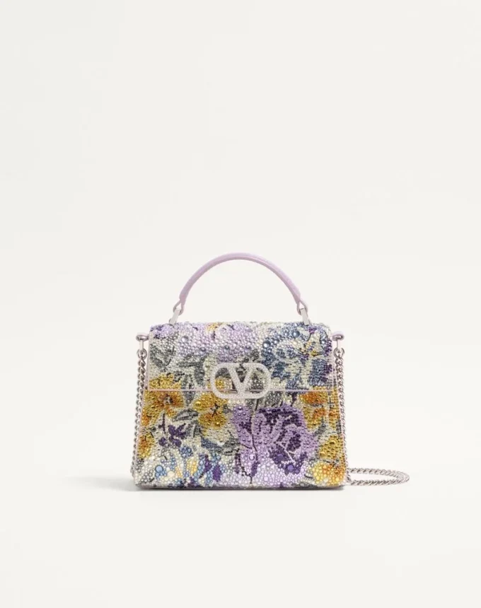 Μίνι τσάντα Valentino Garavani Vsling με μοτίβο Flowerism από στρας και λογότυπο με κόσμημα Μίνι τσάντα Valentino Garavani Vsling με μοτίβο Flowerism από στρας και λογότυπο με κόσμημα