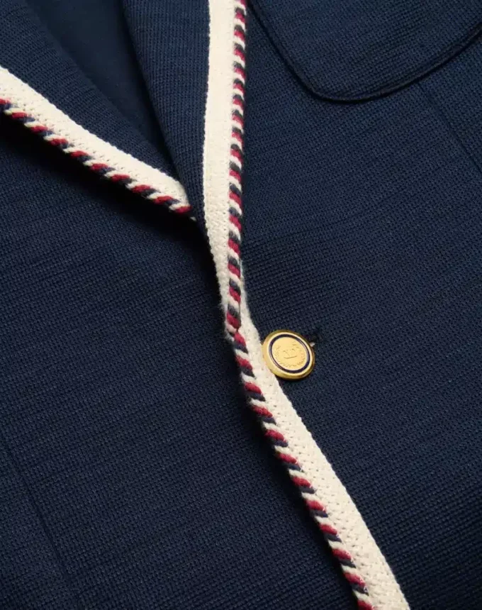 Μονόπετο μπουφάν από βαμβακερό τζέρσεϊ με torchon piping Μονόπετο μπουφάν από βαμβακερό τζέρσεϊ με torchon piping