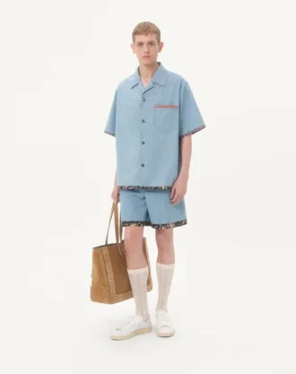 Μπέρμουντα σορτς από τζιν με floral print στο τελείωμα