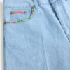 Μπέρμουντα σορτς από τζιν με floral print στο τελείωμα Μπέρμουντα σορτς από τζιν με floral print στο τελείωμα