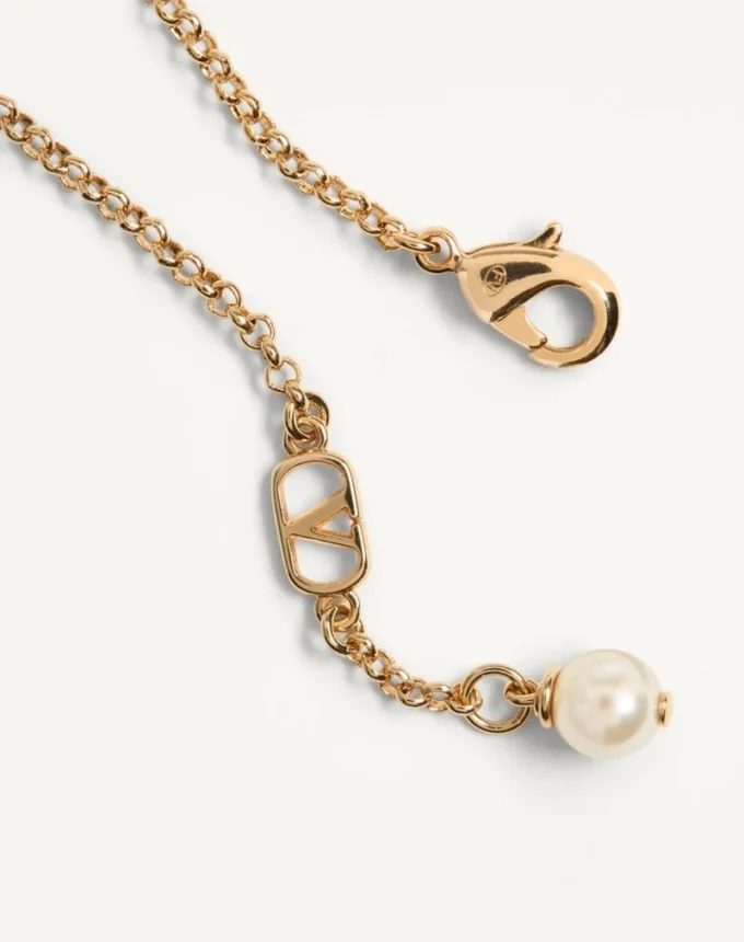 Οβάλ βραχιόλι από μέταλλο και μαργαριτάρια Swarovski® Οβάλ βραχιόλι από μέταλλο και μαργαριτάρια Swarovski®