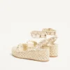 Σανδάλια Rockstud Flatform από πλαστικοποιημένο δέρμα Nappa 45 mm Σανδάλια Rockstud Flatform από πλαστικοποιημένο δέρμα Nappa 45 mm