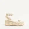 Σανδάλια Rockstud Flatform από πλαστικοποιημένο δέρμα Nappa 45 mm Σανδάλια Rockstud Flatform από πλαστικοποιημένο δέρμα Nappa 45 mm