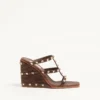Σανδάλια Rockstud Wedge Slide από δέρμα μοσχαριού με κεντημένο σχέδιο Cornely 100 mm Σανδάλια Rockstud Wedge Slide από δέρμα μοσχαριού με κεντημένο σχέδιο Cornely 100 mm