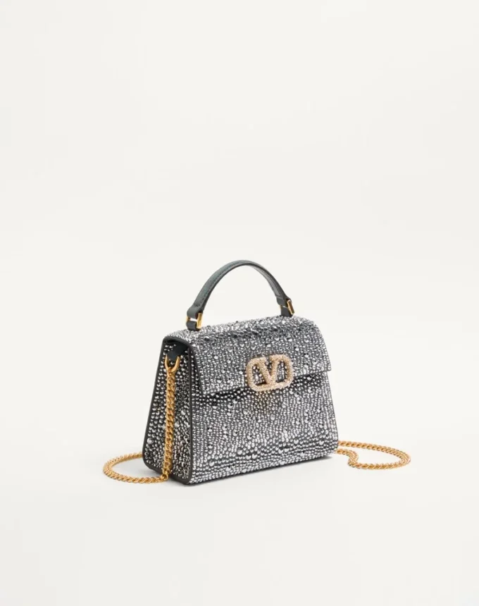 Τσάντα Valentino Garavani Mini Vsling με στρας και λογότυπο με πολύτιμους λίθους Τσάντα Valentino Garavani Mini Vsling με στρας και λογότυπο με πολύτιμους λίθους