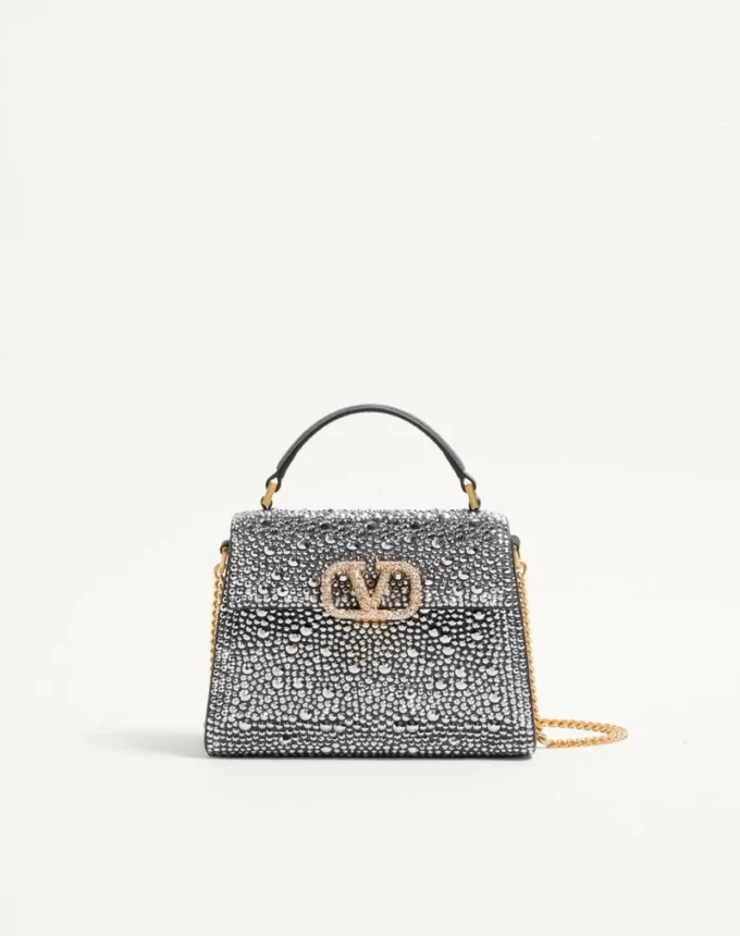 Τσάντα Valentino Garavani Mini Vsling με στρας και λογότυπο με πολύτιμους λίθους Τσάντα Valentino Garavani Mini Vsling με στρας και λογότυπο με πολύτιμους λίθους