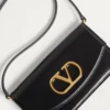 Τσάντα Valentino Garavani Vain από γυαλιστερό δέρμα μοσχαριού Τσάντα Valentino Garavani Vain από γυαλιστερό δέρμα μοσχαριού