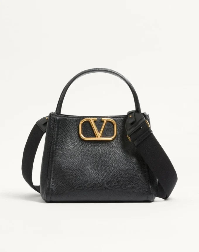 Valentino Garavani Alltime Medium τσάντα χειρός από δέρμα μοσχαριού με κόκκους Valentino Garavani Alltime Medium τσάντα χειρός από δέρμα μοσχαριού με κόκκους