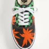Valentino Garavani και Vans χαμηλά αθλητικά παπούτσια από ύφασμα με τυπωμένο λογότυπο VLogo σε μοτίβο σκακιέρας και τυπωμένα τροπικά φύλλα Valentino Garavani και Vans χαμηλά αθλητικά παπούτσια από ύφασμα με τυπωμένο λογότυπο VLogo σε μοτίβο σκακιέρας και τυπωμένα τροπικά φύλλα
