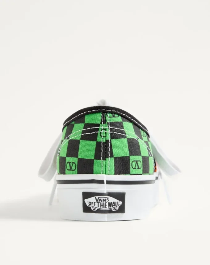 Valentino Garavani και Vans χαμηλά αθλητικά παπούτσια από ύφασμα με τυπωμένο λογότυπο VLogo σε μοτίβο σκακιέρας και τυπωμένα τροπικά φύλλα Valentino Garavani και Vans χαμηλά αθλητικά παπούτσια από ύφασμα με τυπωμένο λογότυπο VLogo σε μοτίβο σκακιέρας και τυπωμένα τροπικά φύλλα