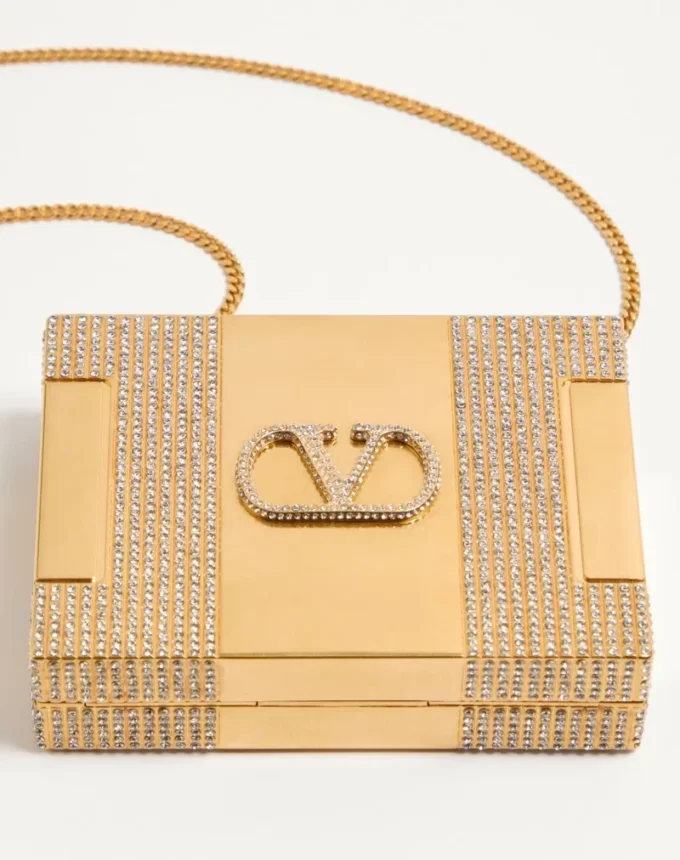 Valentino Garavani Minaumorphe Minaudière από μέταλλο με κρύσταλλα Swarovski® και σατέν θήκη Valentino Garavani Minaumorphe Minaudière από μέταλλο με κρύσταλλα Swarovski® και σατέν θήκη
