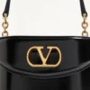 Valentino Garavani Vain Τσάντα καλλυντικών από γυαλιστερό δέρμα μοσχαριού Valentino Garavani Vain Τσάντα καλλυντικών από γυαλιστερό δέρμα μοσχαριού