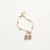 Βραχιόλι Cherryfic από μέταλλο και κρύσταλλα Swarovski® Βραχιόλι Cherryfic από μέταλλο και κρύσταλλα Swarovski®